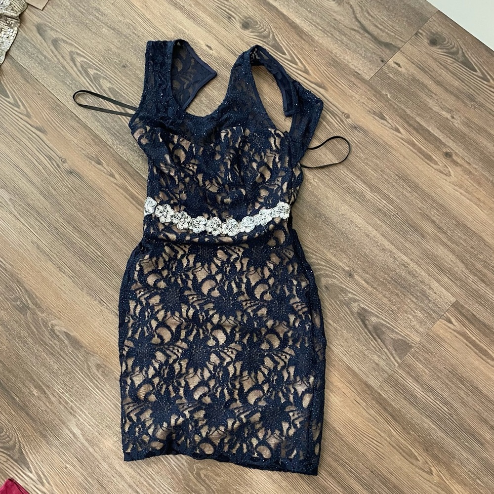 Blue lace dress with open back and rhinestone belt